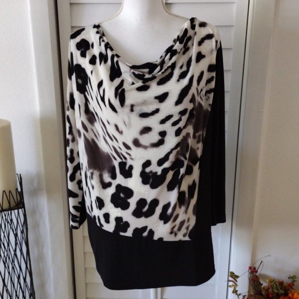 Chico’s leopard color block asymmetric tunic .